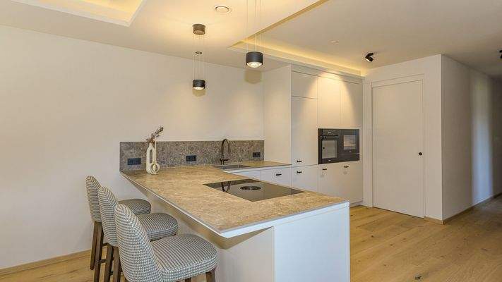 KITZIMMO-Exklusive Neubauwohnung mit traumhaftem Ausblick - Immobilien Brixen.