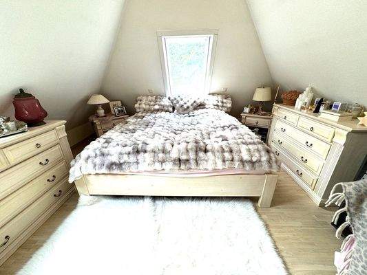 Schlafzimmer im ausgebauten Dachgeschoss