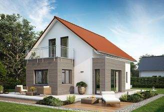 Modernes Fertighaus Lifestyle von massa haus: Zeigt eine helle Außenansicht mit liegender Sonnenlieg