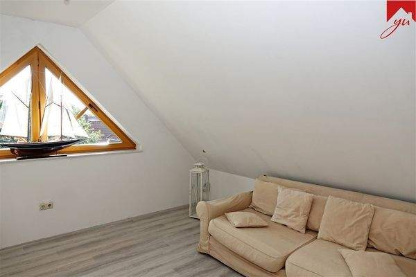 ausgebautes Zimmer im Dachgeschoss 