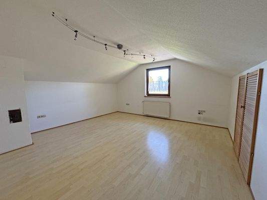 Zimmer im Obergeschoss/Dachgeschoss