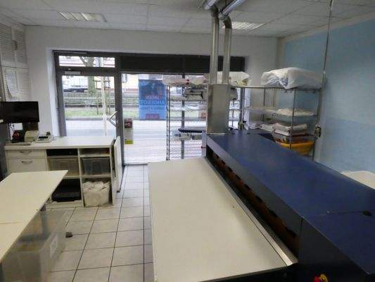 Textilreinigung und Heißmangel