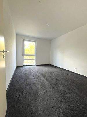 Schlafzimmer mit Teppichboden