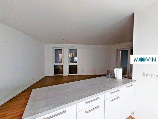 Ansicht II: Wohn- und Esszimmer mit offenem Küchenbereich