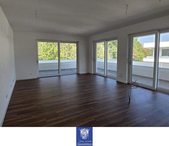 Exklusive Wohnung mit großer Dachterrasse in ruhiger Lage! - Foto 2