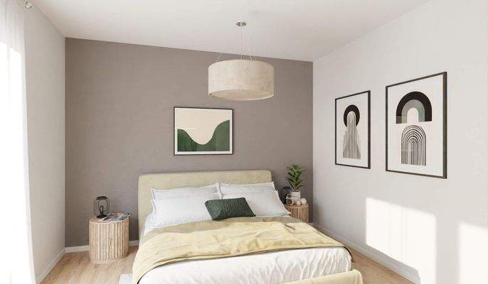 Das gemütliche Schlafzimmer wird durch bodentiefe 