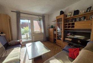 Wohnzimmer mit Balkon