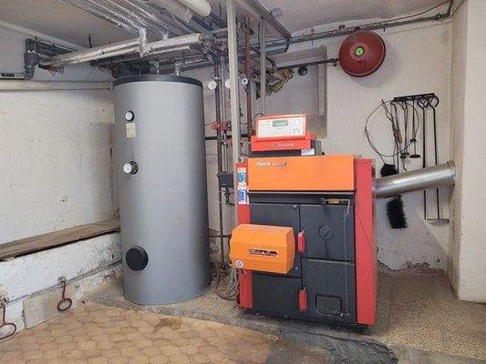 024 Kombinierte Öl- und Holzheizung