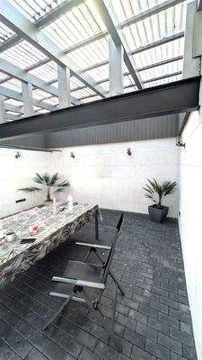 überdachter Freisitz im Hof