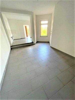 Wohnraum mit offener Küche