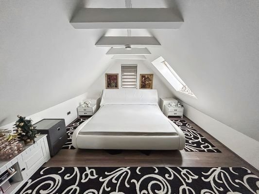 Schlafzimmer Spitzboden