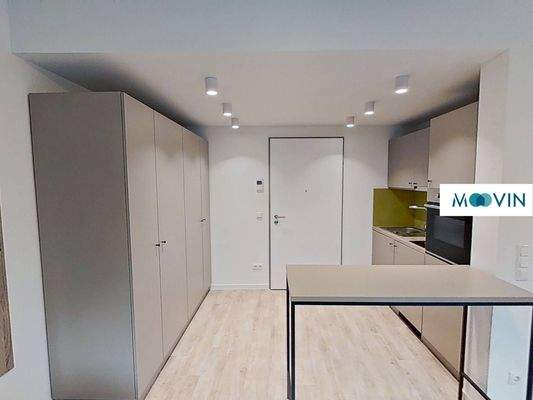 Ansicht V: Wohn- und Schlafzimmer mit offenem Küchenbereich