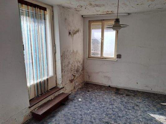 Zimmer mit Zugang zum Garten