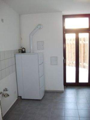 Küche mit Ausgang zur Terrasse 