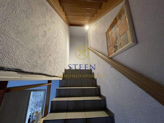 Treppe zum 1-Zi-Apt.