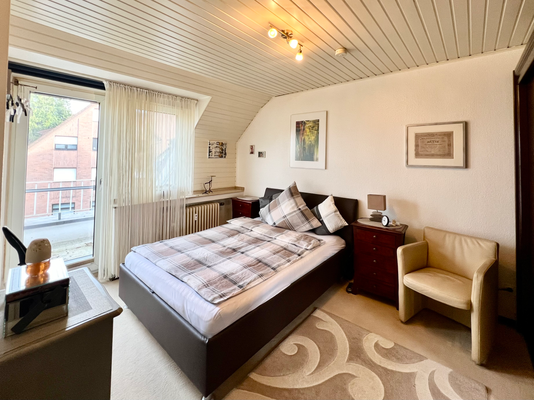 Schlafzimmer mit Balkon