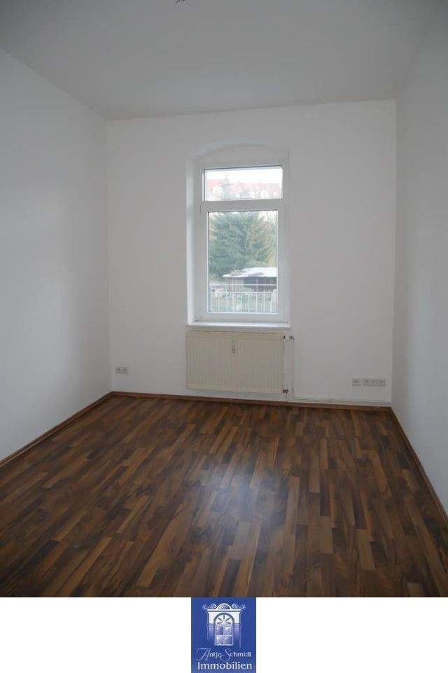 Ihre perfekte Familienwohnung mit Balkon und Blick ins Grüne in sehr schöner Lage! - Photo 2