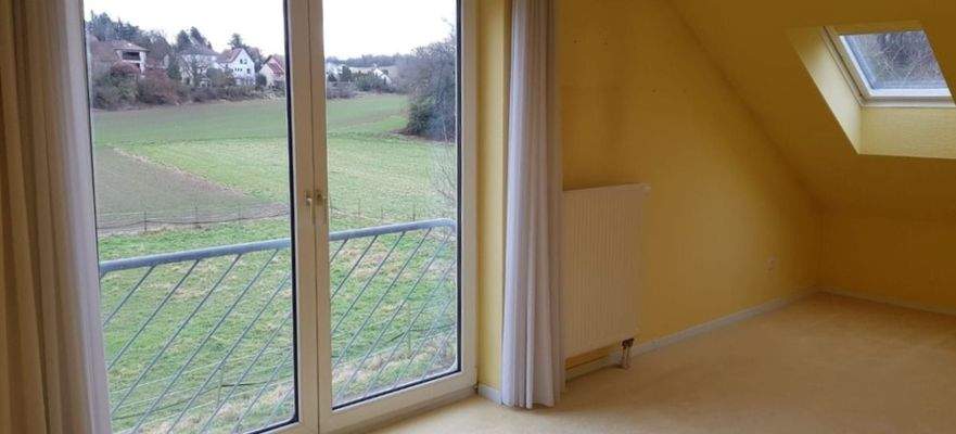 Schlafzimmer im DG mit Ausblick