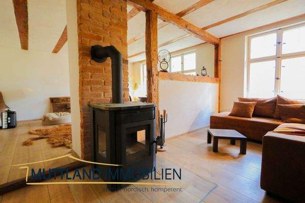 Wohnzimmer mit Kamin