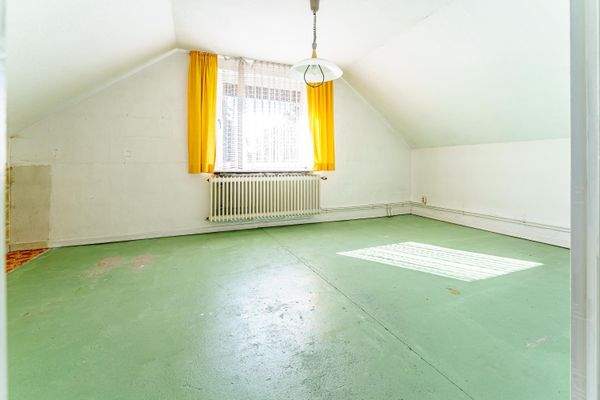 1. Schlafzimmer im Obergeschoss.