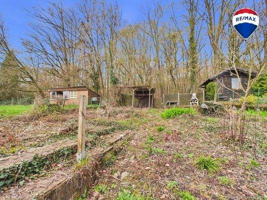 REMAX Immobilien DeLux Mehrfamilienhaus Garten Saarbrücken Mark Borowicz