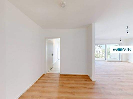 Ansicht VI: Wohn- und Esszimmer mit offenem Küchenbereich