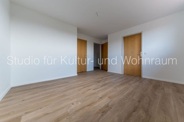 Wohnzimmer mit Blick auf Kueche