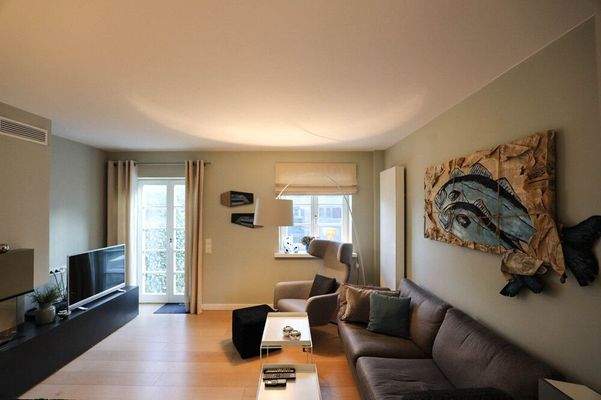 Wohnzimmer mit Ausgang auf die Terrasse