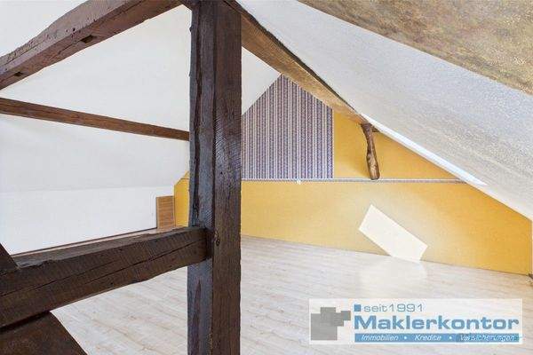 Dachgeschoss/Wohnbereich mit Kamin