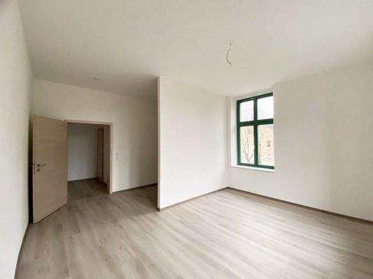 Schlafzimmer mit Ankleideraum