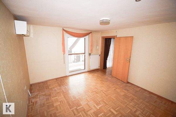 Schlafzimmer mit Balkon