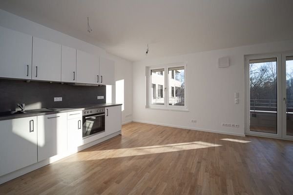 Wohnzimmer mit Einbauküche (Beispiel)