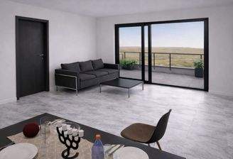 Wohnzimmer mit Balkonausblick