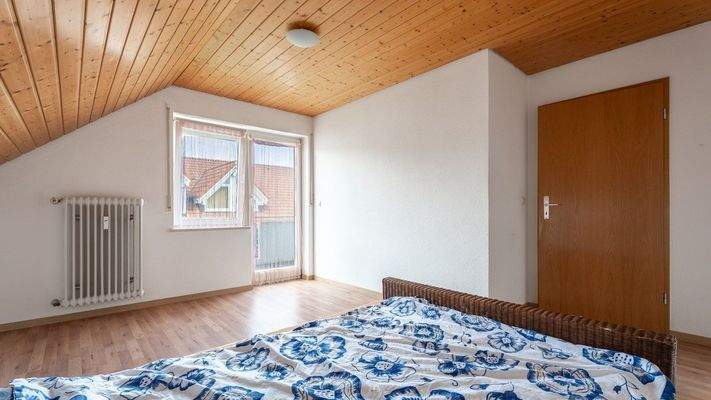Schlafzimmer mit Balkonzugang
