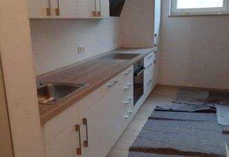 Wohnzimmer m. offener Küche