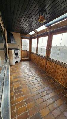 Wintergarten mit Kamin