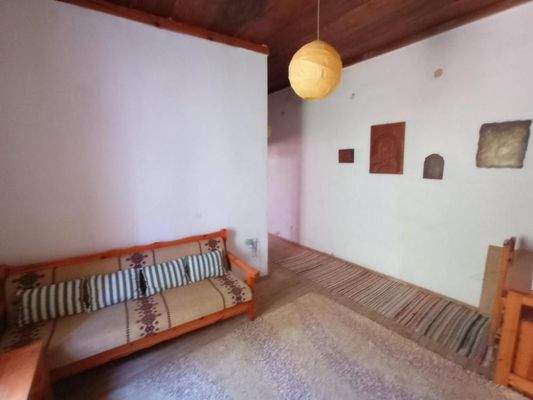 Kreta, Neapoli: Großes Steinhaus mit unvollendetem Gästehaus, Olivenhain und Garten zu verkaufen