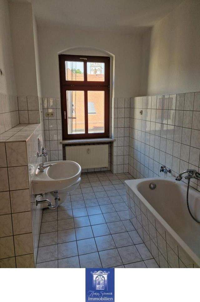 Zentral gelegene Wohnung mit Tageslichtbad und Wohnküche! - Foto 3
