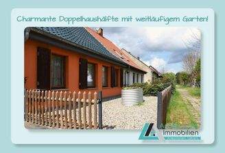 Charmante Doppelhaushälfte mit weitläufigem Garten