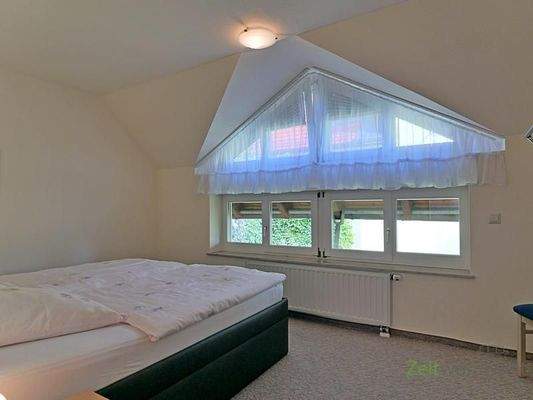 Fensterfront im Schlafzimmer