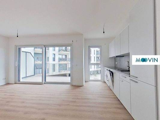 Ansicht II: Wohn- und Esszimmer mit offenem Küchenbereich