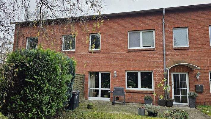 Wohnungseingang mit Terrasse