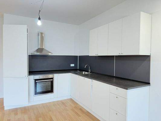 Blick zur Einbauküche