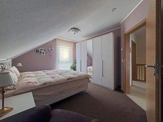 DG Schlafzimmer 1: Gemütlicher Raum für ruhige Nächte und entspanntes Aufwachen