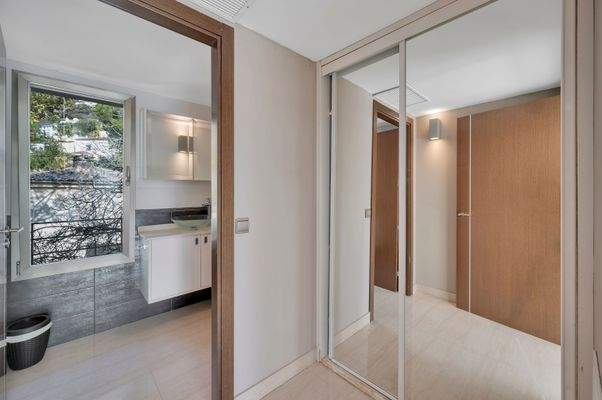 Guest toilet and closet in villa in Costa d'en Blanes