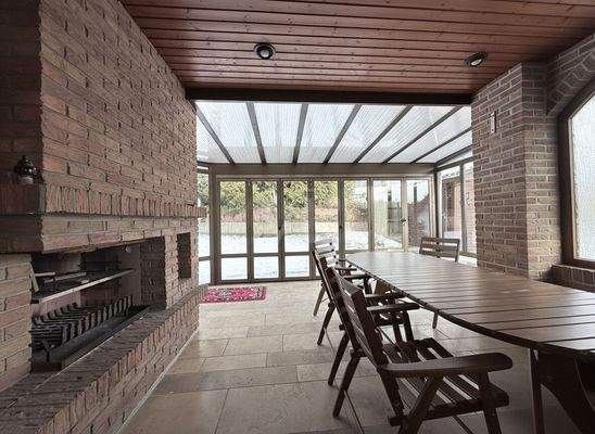 Wintergarten mit Grillkamin
