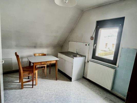 Zimmer mit Küchenanschluss im Obergeschoss