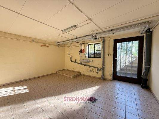 Waschküche mit Gartenzugang