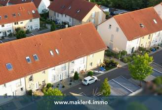 Reihenhausanlage – straßenseitige Ansich