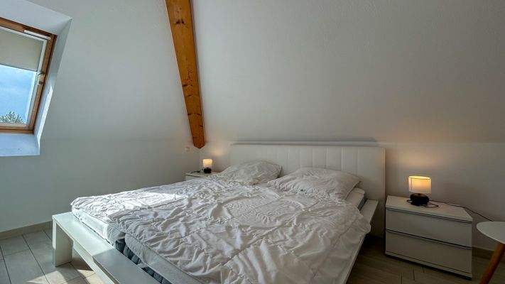 Schlafzimmer im Spitzboden